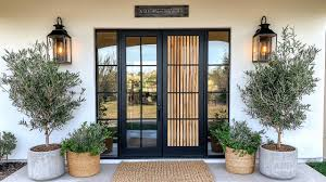 The Modern Homestead's Welcome: A Guide to Incorporating Farmhouse Entry Door Trends in Any Architectural Style